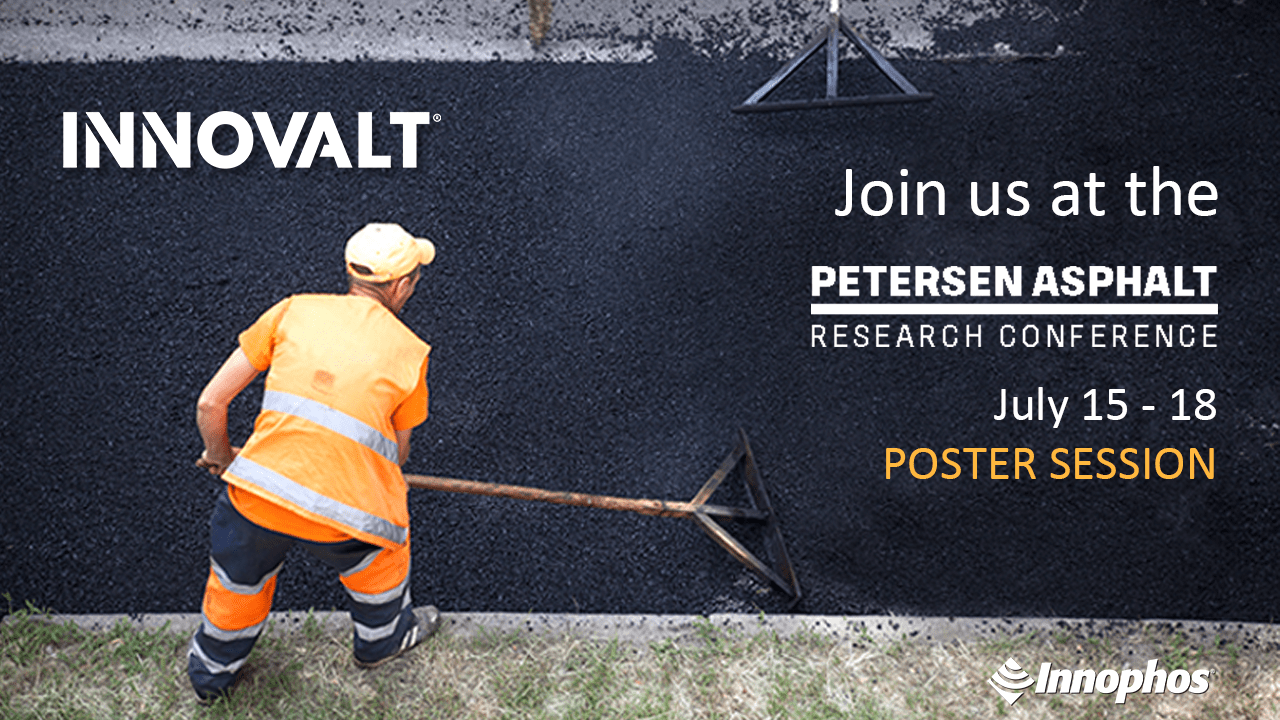 Man leveling wet asphalt on road
